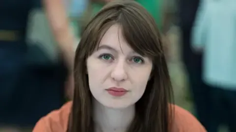 Sally Rooney declares she will not travel to the UK due to potential arrest